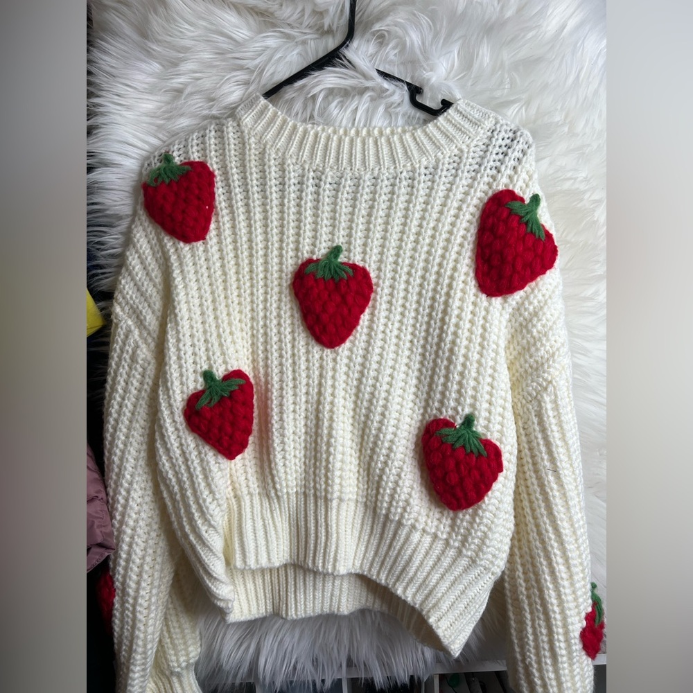 Cozy Cream Sweater with Red Strawberry Accents